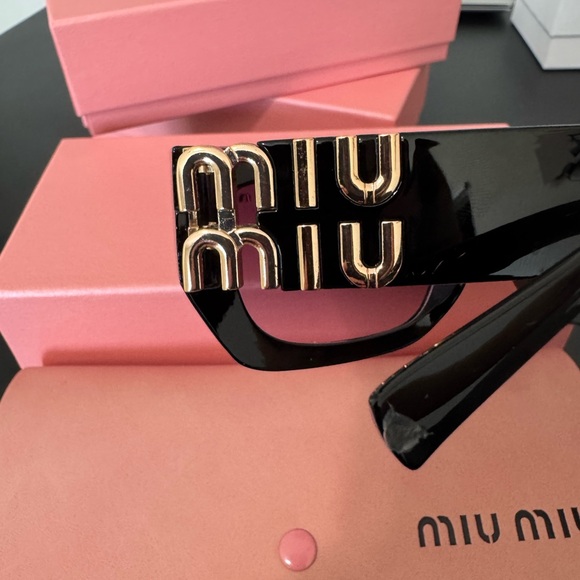 Miu Miu Glossy Black Sunglasses with Gradient Purple Lenses - Picture 6 of 8